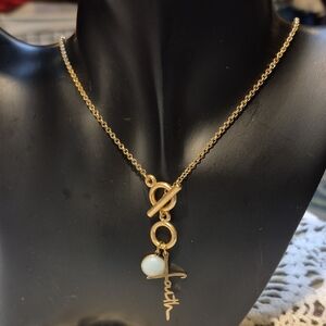 Gold Tone Pendant Necklace with Blue Stone And Faith Charms